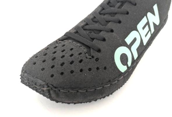 Open Barefoot — close-up of hand-sewn construction detail